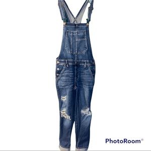 Distressed overalls.